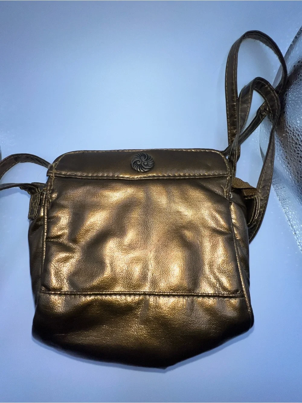 Vintage metallic bronze crossbody purse manufactured by the brand Beverly Hills
